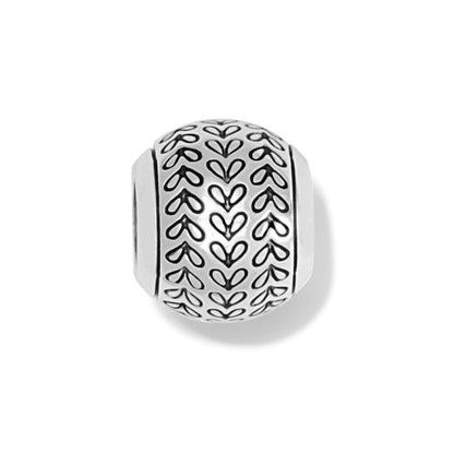 Brighton silver-plated bead charm with embossed leaf and chevron pattern along the rounded surface on a white background