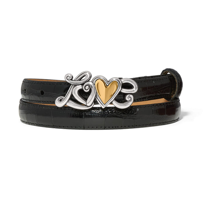 Brighton black croc-embossed leather belt with silver-tone Love script buckle and gold-tone heart accent on a white background