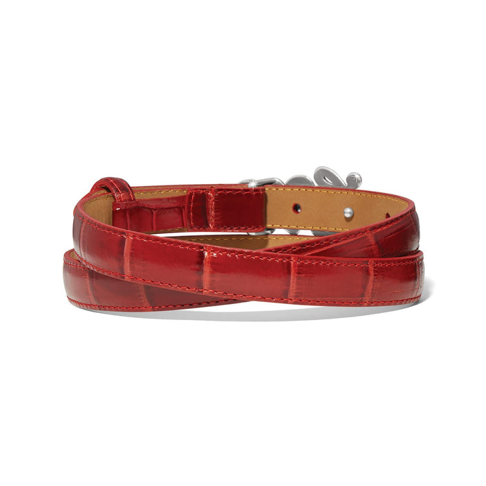 Brighton belt in red leather with crocodile-embossed texture and silver-tone buckle hardware on a white background