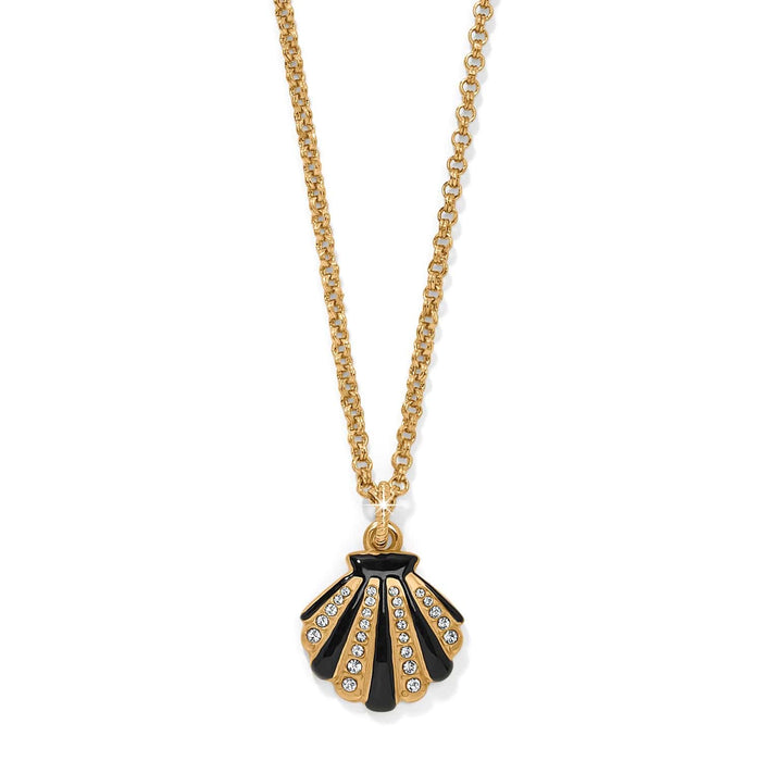 Brighton pendant necklace with gold-tone chain and black enamel seashell pendant accented with crystals on a white background