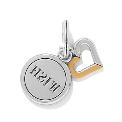 Brighton charm set with silver-tone round Wish disc and two-tone open heart pendant on a white background