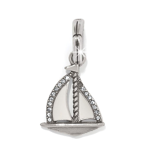 Brighton sailboat charm with silver-plated finish, white enamel sails, and crystal accents on a white background