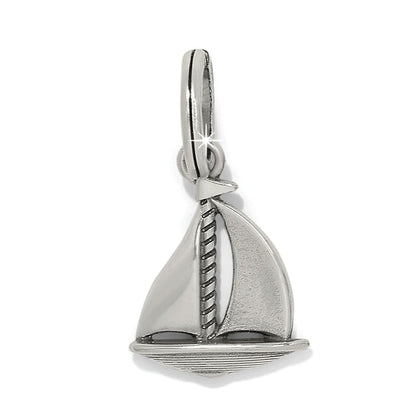 Brighton sailboat charm with silver-plated finish featuring polished and textured sails and ribbed hull on a white background